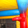 A red and blue inflatable castle with yellow walls.