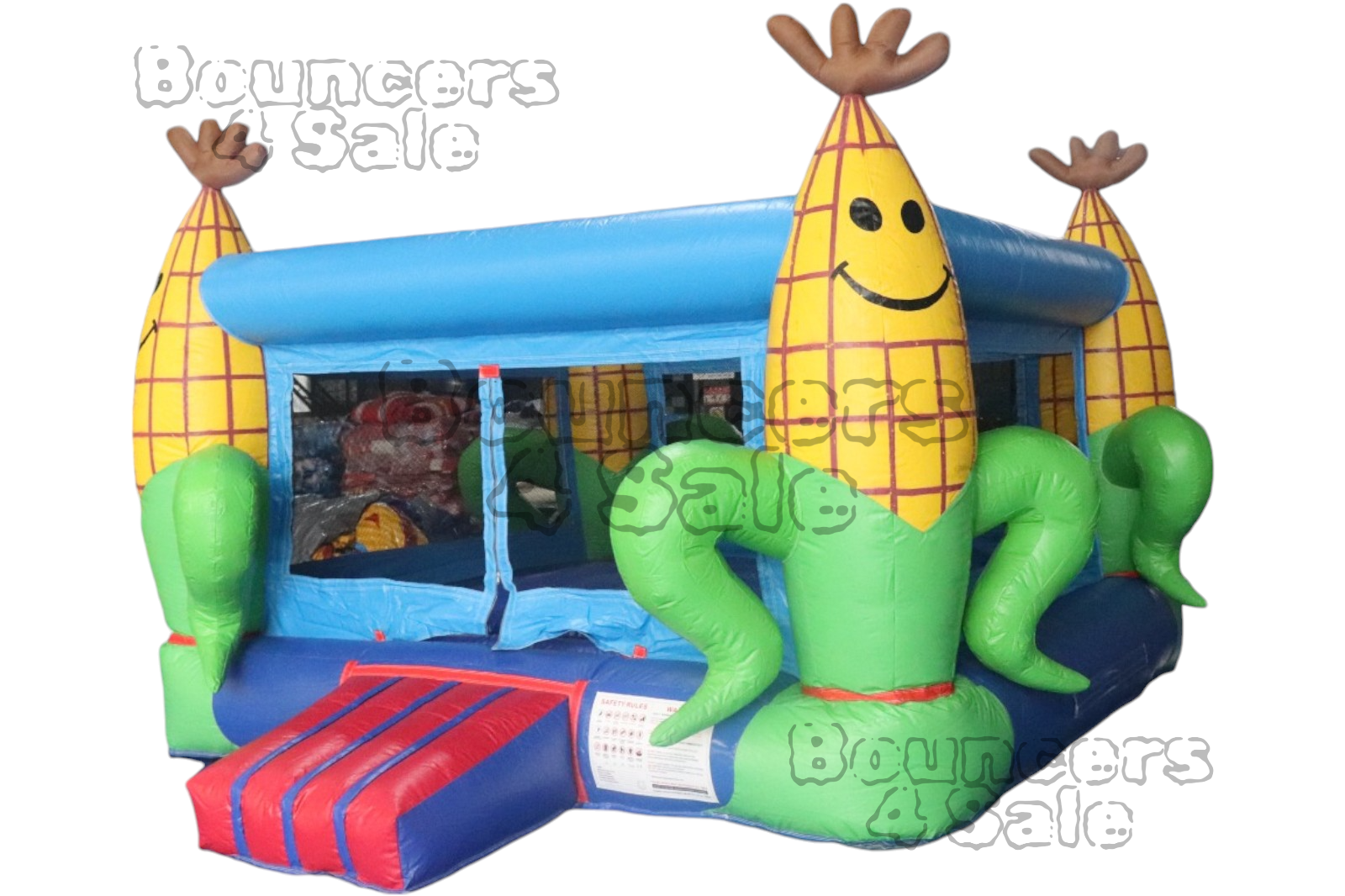 A corn shaped bounce house with many different designs.