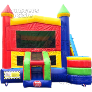 A colorful inflatable castle with slide and obstacles.