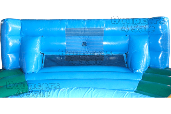 A blue inflatable slide with a black and white design.