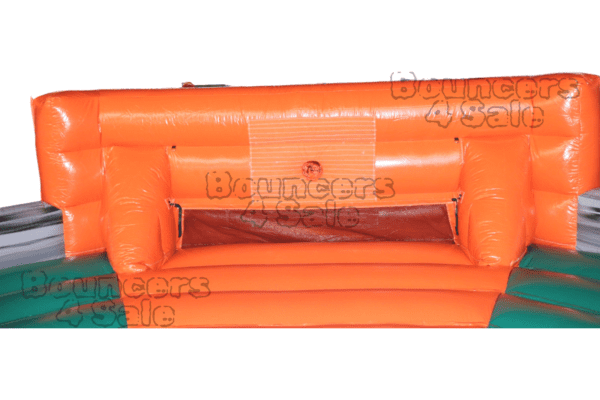 A orange inflatable couch with an open window.