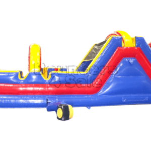 A blue, red and yellow inflatable obstacle course.