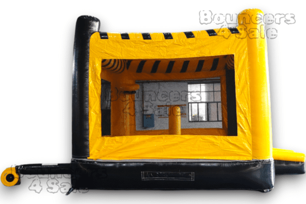 A black and yellow inflatable bounce house with windows.