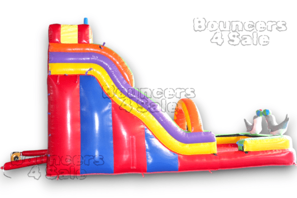 A large inflatable slide with obstacles.