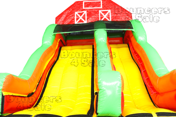 A large inflatable slide with an animal theme.