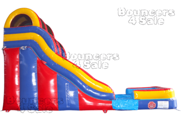 A large inflatable slide with obstacles on it.