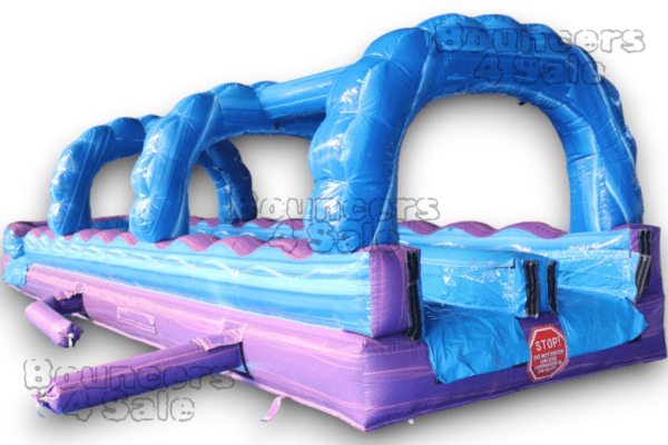 A purple and blue inflatable obstacle course.