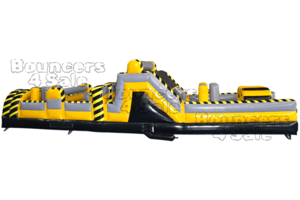 A yellow and black inflatable obstacle course.